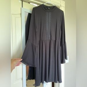 Black bell sleeve dress with lack detail by Torrid